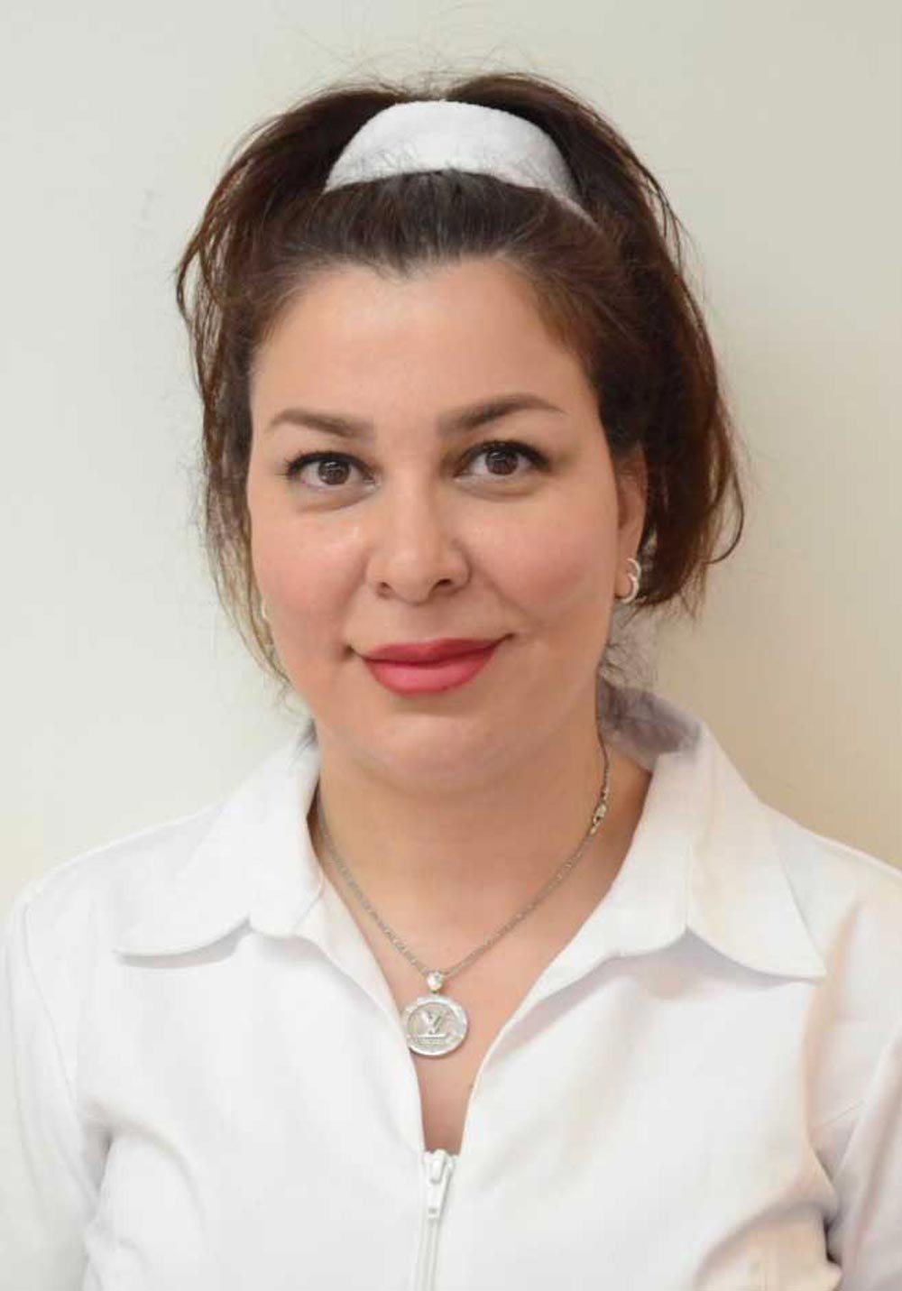 Medarbetare som ler in i kameran